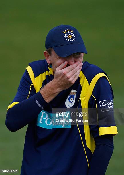 Hampshire fielder Dominick Cork shares a joke with a spectator during the Clydesdale Bank 40 match between Durham Dynamos and Hampshire Royals at The...