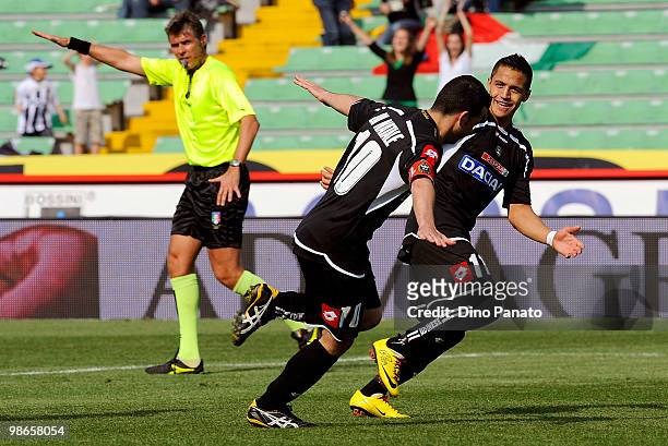 Antonio Di Natale of Udinese celebrates with team mate Alexis Alejandro Sanchez after scoring his team's fourth goal during the Serie A match between...