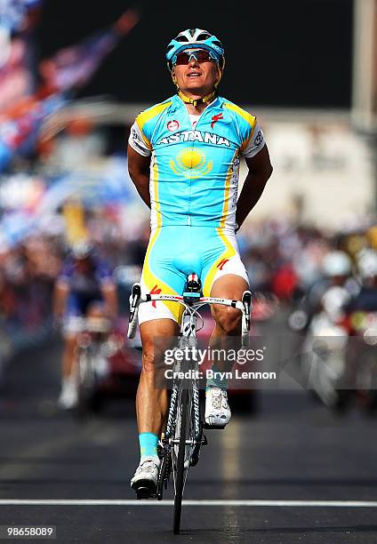 Alexandre Vinokourov of Astana and Kazakhstan celebrates as he crosses the finish line to win the 96th Liège-Bastogne-Liège race on April 25, 2010 in...