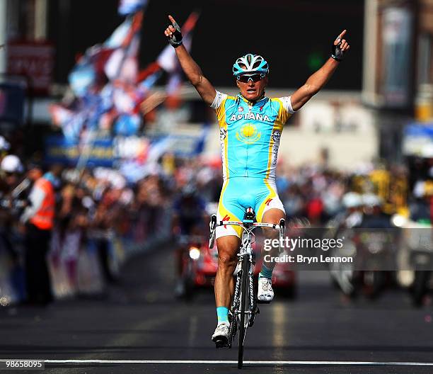 Alexandre Vinokourov of Astana and Kazakhstan celebrates as he crosses the finish line to win the 96th Liège-Bastogne-Liège race on April 25, 2010 in...