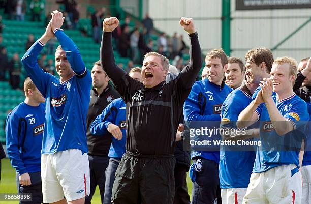 Rangers assistant Ally McCoist celebrates with the team winning the league after the Clydesdale Bank Scottish Premier League match between Hibernian...