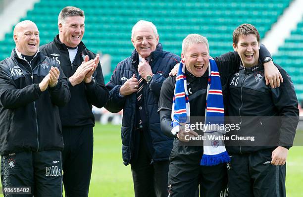 Rangers manager Walter Smith and assistant Ally McCoist laugh at celebrations going on after the Clydesdale Bank Scottish Premier League match...