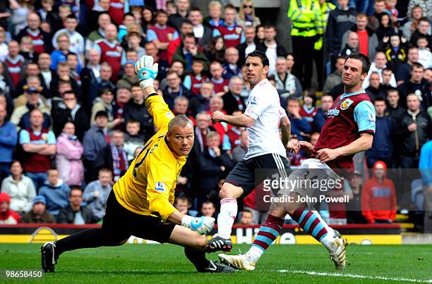 Maxi Rodriguez of Liverpool scores his team's third goal during the Barclays Premier League match between Burnley and Liverpool at Turf Moor on April...