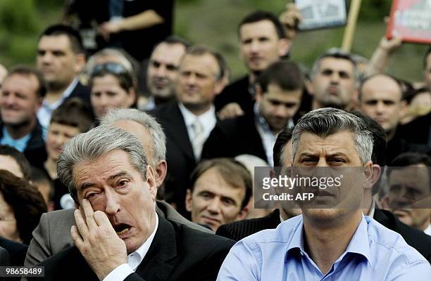 Kosovo Prime Minister Hashim Thaci and his Albanian counterpart Sali Berisha attend a ceremony on April 25 in the village of Vermnice of a...