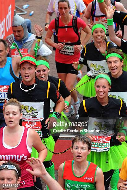 Princess Beatrice, Sam Branson and Holly Branson complete the Virgin London Marathon on April 25, 2010 in London, England.