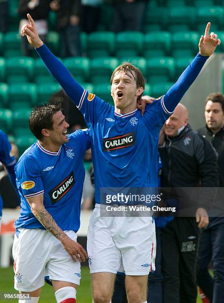 Rangers Sasa Papac and Nacho Novo celebrate winning the league after the Clydesdale Bank Scottish Premier League match between Hibernian and Rangers...