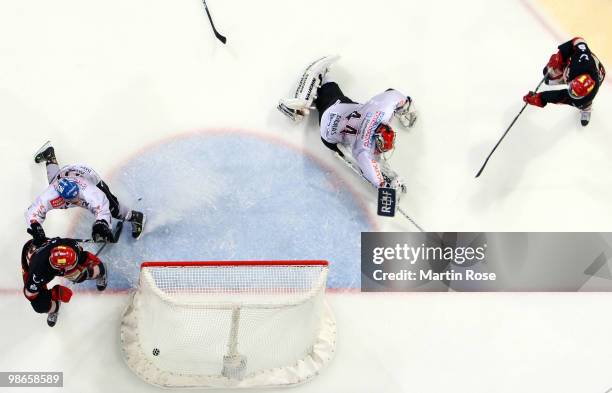 Thomas Dolak of Hannover scores his team's winning goal during the DEL play off final match between Hannover Scorpions and Augsburger Panther at TUI...