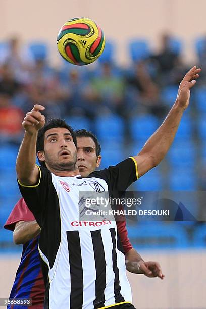 Hamza Younes of Tunisia�s CS Sfaxien competes with Egypt's Petrojet club player Karim Zekri during their African Champions League third round, first...