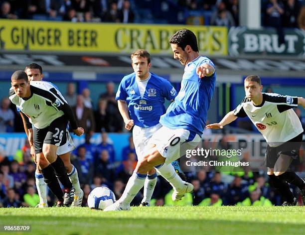 Mikel Arteta of Everton scores the winning goal from the penalty spot during the Barclays Premier League match between Everton and Fulham at Goodison...