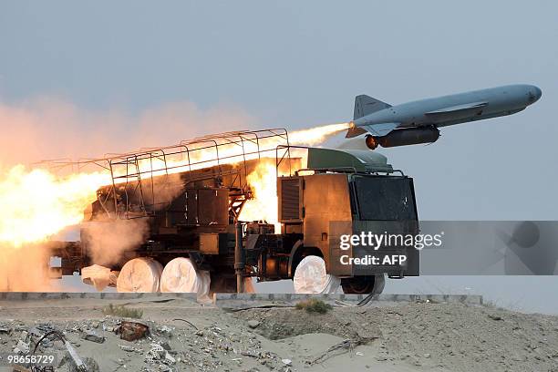 An Iranian Saeqeh missile is launched during war games on April 25, 2010 in southern Iran, near the Strait of Hormuz, the narrow strategically...