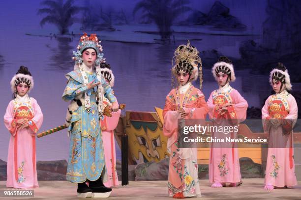 Schoolchildren perform Cantonese opera on the stage on June 26, 2018 in Hong Kong, China. Thirty-four children from Po Leung Kuk Grandmont Primary...