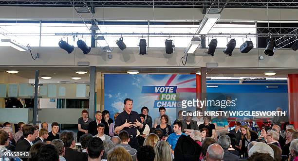 Britain's main opposition leader David Cameron delivers a speech during a question and answer session at a community meeting in Stockton-on-Tees,...
