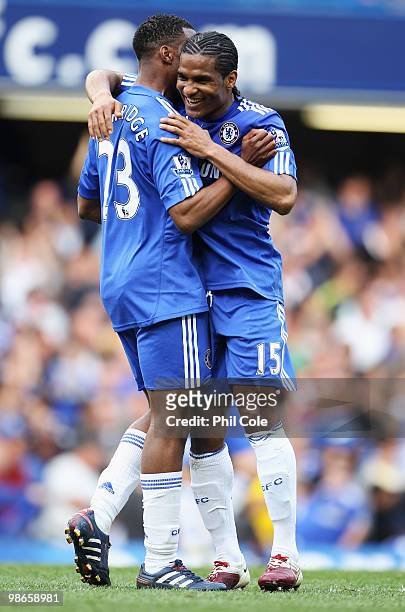 Florent Malouda celebrates with Daniel Sturridge of Chelsea as he scores their seventh goal during the Barclays Premier League match between Chelsea...