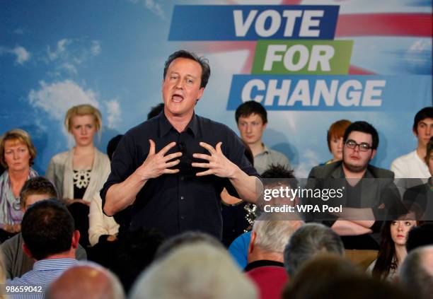 David Cameron, leader of the Conservatives, Britain's opposition party, during a question and answer session at a community meeting in...