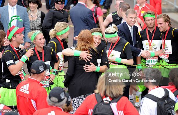 Sarah Ferguson hugs her daughter Princess Beatrice's boyfriend Dave Clark after he completed the Virgin London Marathon on April 25, 2010 in London,...
