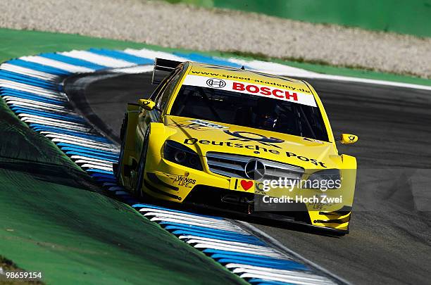 David Coulthard of Great Britain and Mücke Motorsport AMG Mercedes drives during the DTM 2010 German Touring Car Championship race on April 25, 2010...