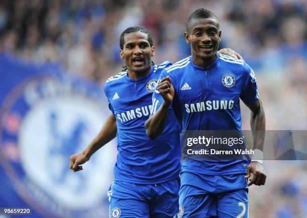 Salomon Kalou of Chelsea celebrates with Florent Malouda after scoring his third and his team's fourth goal during the Barclays Premier League match...