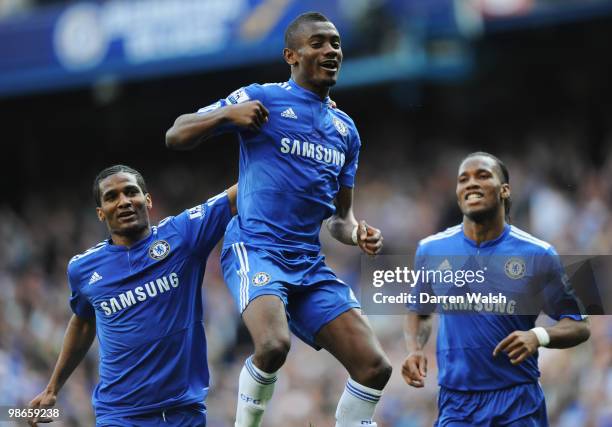 Salomon Kalou of Chelsea celebrates with Florent Malouda and Didier Drogba after scoring his third and his team's fourth goal during the Barclays...