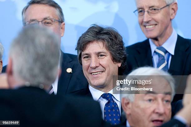Amado Boudou, economy minister of Argentina, poses during the Development Committee group photo of the IMF-World Bank spring meetings in Washington,...