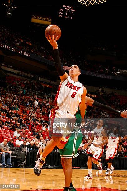 Carlos Arroyo of the Miami Heat shoots against the Boston Celtics in Game Four of the Eastern Conference Quarterfinals during the 2010 NBA Playoffs...