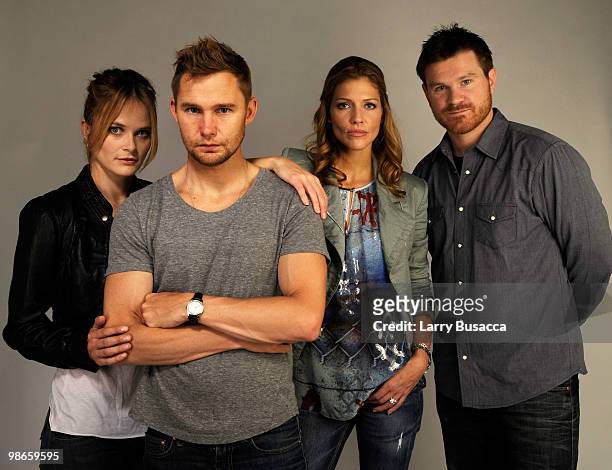 Actors Rachel Blanchard, Brian Geraghty and Tricia Helfer pose with director Andrew Paquin from the film "Open House" at the Tribeca Film Festival...