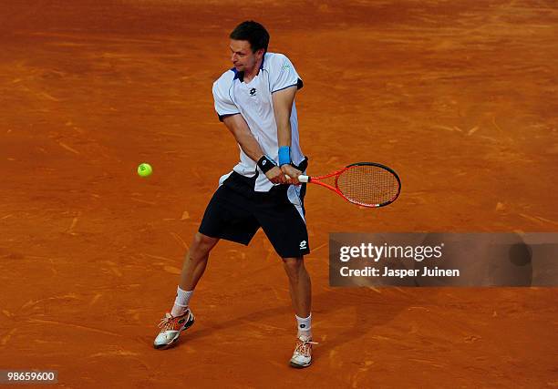 Robin Soderling of Sweden plays a doublehanded backhand to Fernando Verdasco of Spain on day seven of the ATP 500 World Tour Barcelona Open Banco...