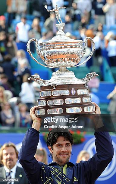 Fernando Verdasco of Spain holds the winners trophy aloft after winning the final match against Robin Soderling of Sweden on day seven of the ATP 500...