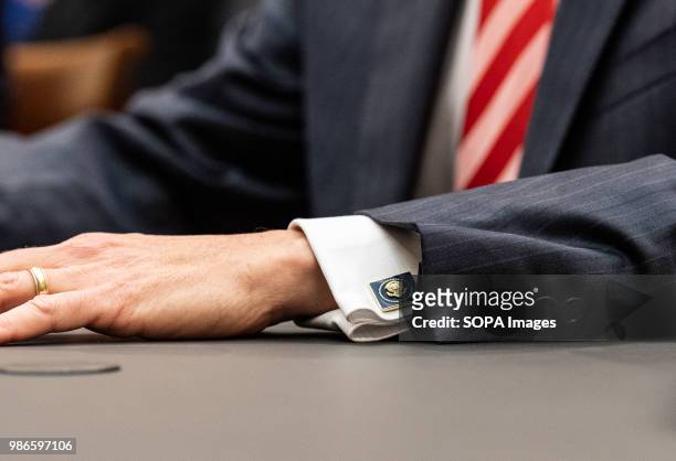 Rod Rosenstein, United States Deputy Attorney General, wearing cufflinks with the Great Seal of the United States, at the House Judiciary Committee...