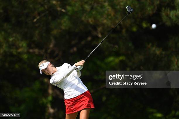 Nelly Korda hits her tee shot on the second hole during the first round of the KPMG Women's PGA Championship at Kemper Lakes Golf Club on June 28,...