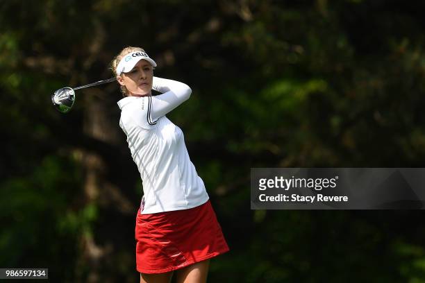 Nelly Korda hits her tee shot on the second hole during the first round of the KPMG Women's PGA Championship at Kemper Lakes Golf Club on June 28,...