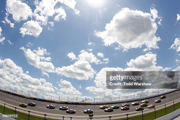 Jeff Burton, driver of the Caterpillar Chevrolet, leads the field during the NASCAR Sprint Cup Series Aaron's 499 at Talladega Superspeedway on April...