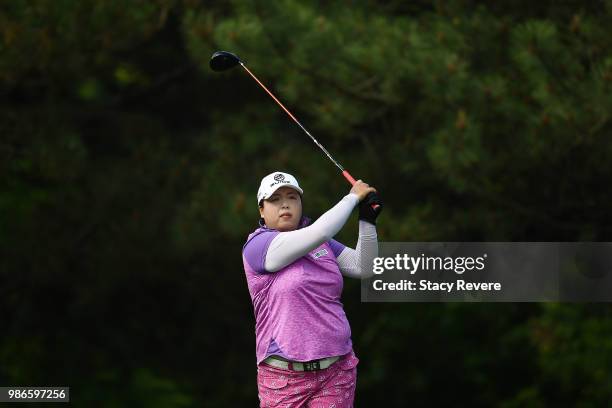 Shanshan Feng of China hits her tee shot on the second hole during the first round of the KPMG Women's PGA Championship at Kemper Lakes Golf Club on...