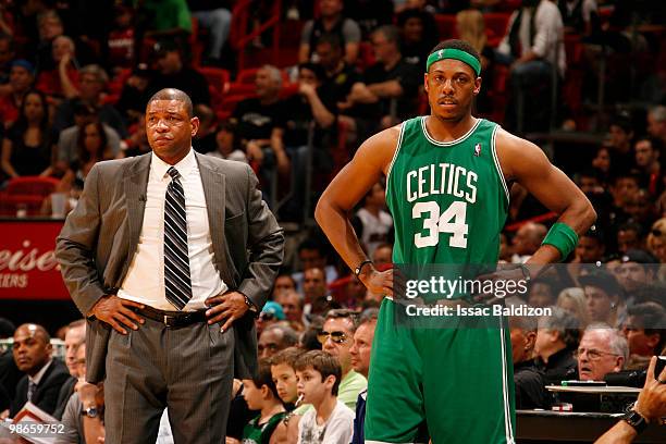 Boston Celtics head coach Doc Rivers and Paul Pierce of the Boston Celtics take a breather against the Miami Heat in Game Four of the Eastern...