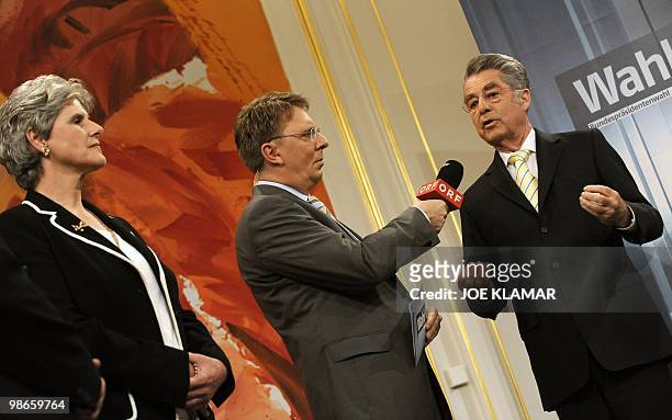Austrian Presidential candidate of the right-wing Freedom party, FPOE, Barbara Rosenkranz listens to Austrian President Heinz Fischer speaking to ORF...