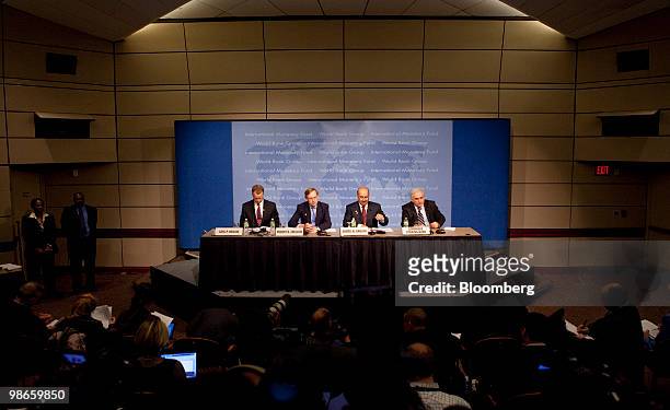 Carl Hanlon, World Bank spokesman, left to right, Robert Zoellick, president of the World Bank, Sheikh Mohammed Bin Essa Al-Khalifa, chief executive...