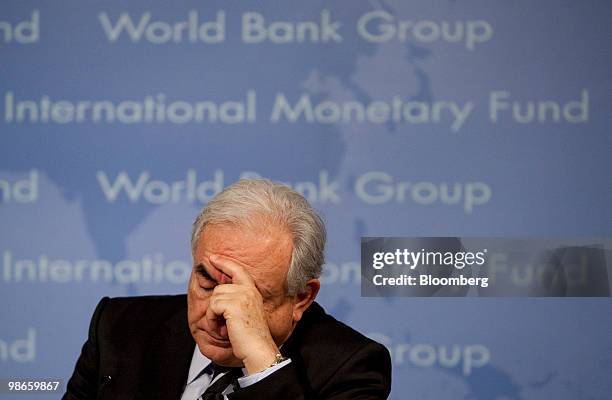 Dominique Strauss-Kahn, managing director of the International Monetary Fund, listens during a news conference of the IMF-World Bank spring meetings...