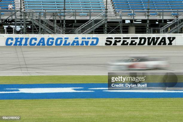 Korbin Forrister, driver of the Now Matters More Toyota, practices for the NASCAR Camping World Truck Series Overton's 225 at Chicagoland Speedway on...