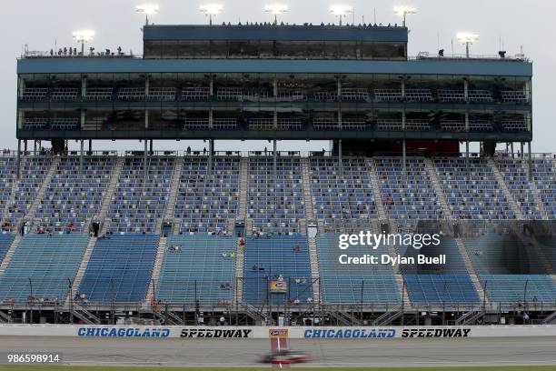Fans look on as drivers practice for the NASCAR Camping World Truck Series Overton's 225 at Chicagoland Speedway on June 28, 2018 in Joliet, Illinois.