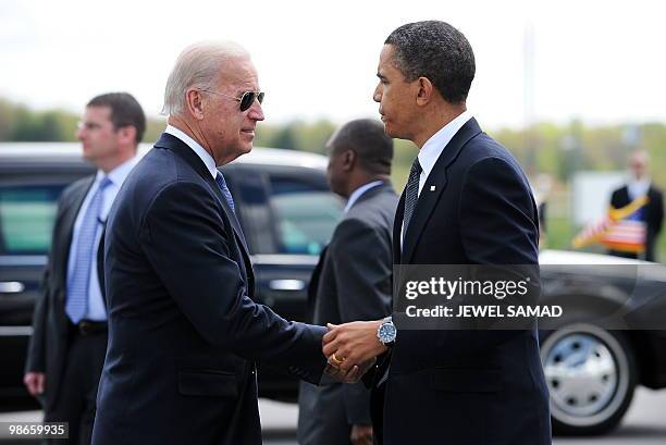 President Barack Obama is greeted by Vice President Joe Biden as he arrives in Backley, West Virginia, on April 25, 2010 to attend a memorial service...