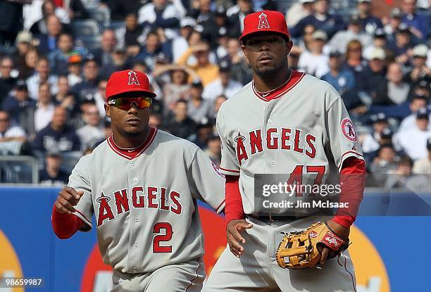 Howard Kendrick and Erick Aybar of the Los Angeles Angels of Anaheim look on against the New York Yankees during the Yankees home opener at Yankee...