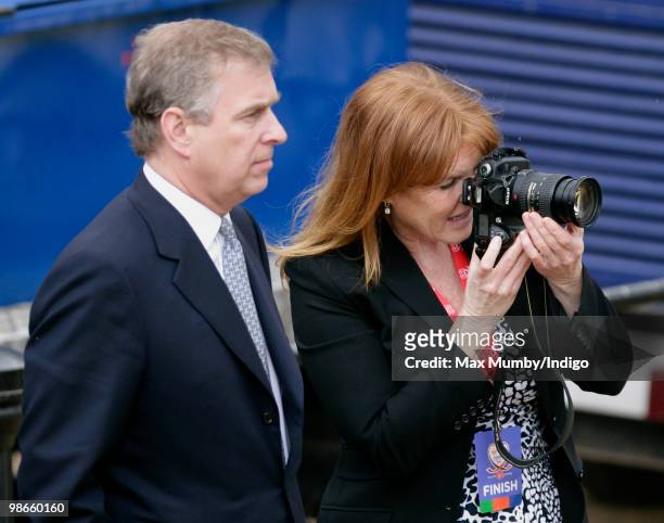 Prince Andrew, The Duke of York and ex-wife Sarah Ferguson, The Duchess of York wait by the finish line of the Virgin London Marathon for daughter...