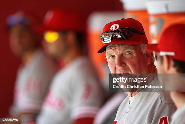 Manager Charlie Manuel of the Philadelphia Phillies sits in the dugout before the Major League Baseball game against the Arizona Diamondbacks at...