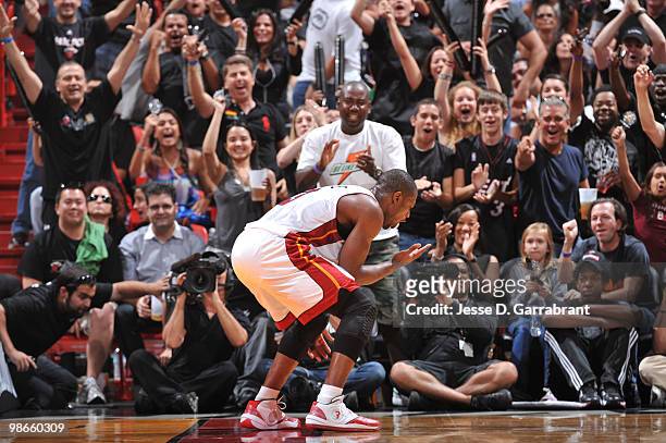Dwyane Wade of the Miami Heat celebrates against the Boston Celtics in Game Four of the Eastern Conference Quarterfinals during the 2010 NBA Playoffs...