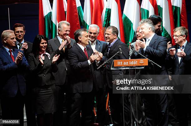 Party leader and prime minister candidate of Fidesz Civic Party Viktor Orban celebrates their victory with his party members in front of their...
