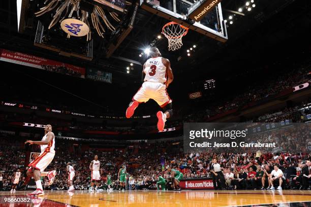 Dwyane Wade of the Miami Heat dunks against the Boston Celtics in Game Four of the Eastern Conference Quarterfinals during the 2010 NBA Playoffs at...