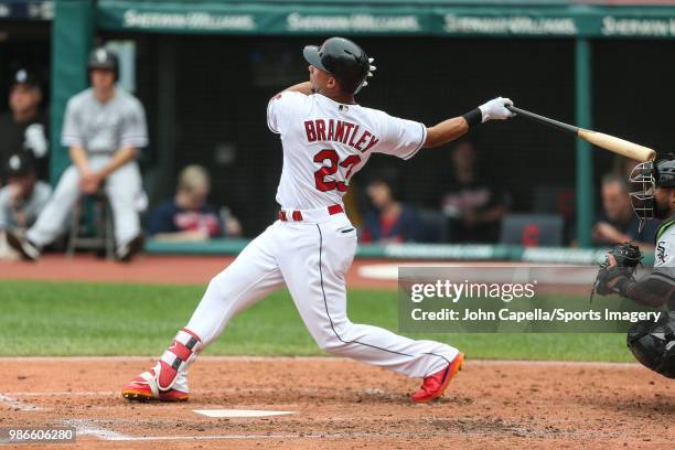 Michael Brantley of the Cleveland Indians bats during a MLB game against the Chicago White Sox at Progressive Field on June 20, 2018 in Detroit,...