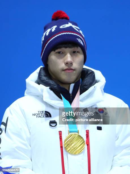 Yun Sung Bin from South Korea celebrating his gold medal during the award ceremony of the men's skeleton event of the 2018 Winter Olympics in the...