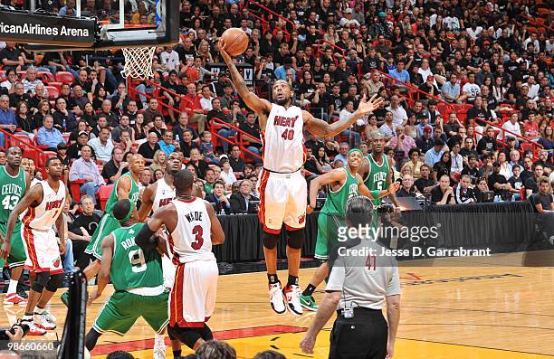 Udonis Haslem of the Miami Heat rebounds against the Boston Celtics in Game Four of the Eastern Conference Quarterfinals during the 2010 NBA Playoffs...
