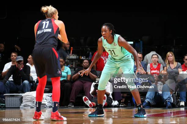 Elena Delle Donne of the Washington Mystics handles the ball against Tina Charles of the New York Liberty on June 28, 2018 at Capital One Arena in...