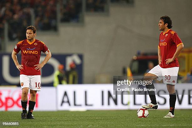 Francesco Totti and Luca Toni of AS Roma show their dejection during the Serie A match between AS Roma and UC Sampdoria at Stadio Olimpico on April...